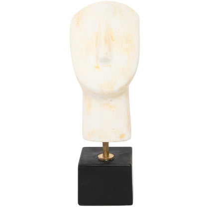 A Cycladic head sculpture mounted on a black base, with a flat, geometric quality and a creamy color with some orange staining.