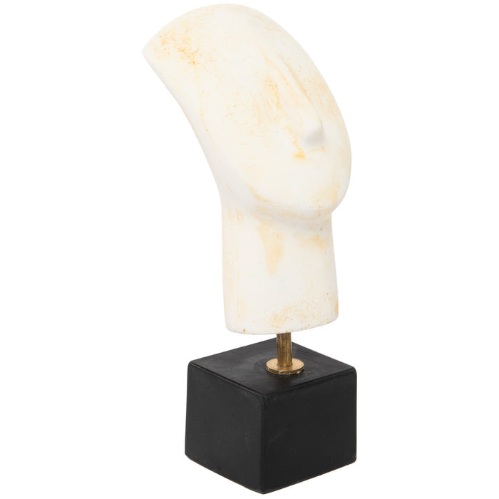 A Cycladic head sculpture