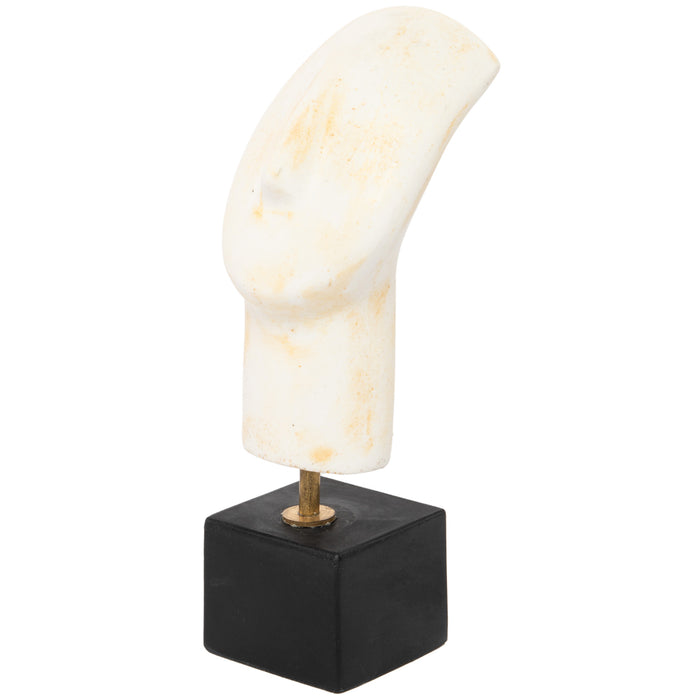 A Cycladic head sculpture