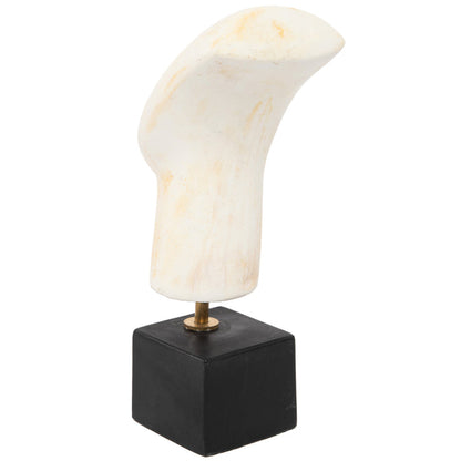 A Cycladic head sculpture