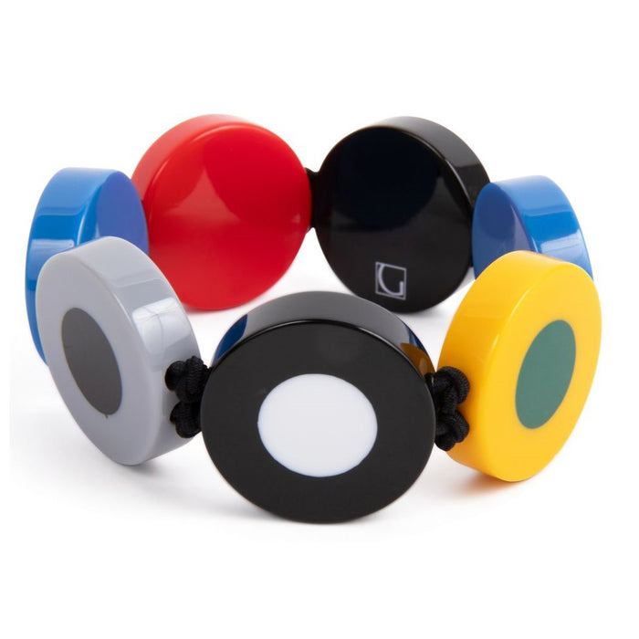 A multicolored resin bracelet with a French dot pattern, featuring beads in red, blue, black, silver, white, and yellow.